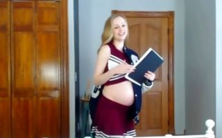 Cute pregnant college girl poses nicely in homemade xxx video